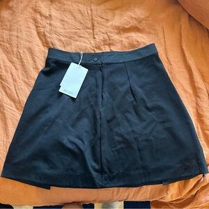 COS SHELL-PANEL A-LINE MINI
SKIRT - Black